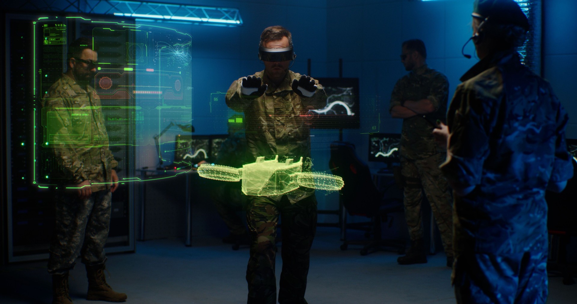 Military men controlling holographic model of drone